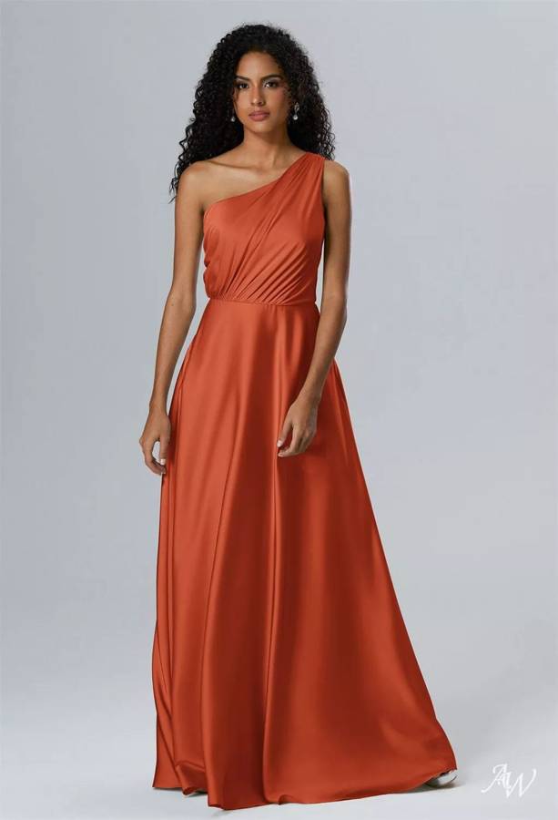 A terracotta satin one-shoulder bridesmaid gown