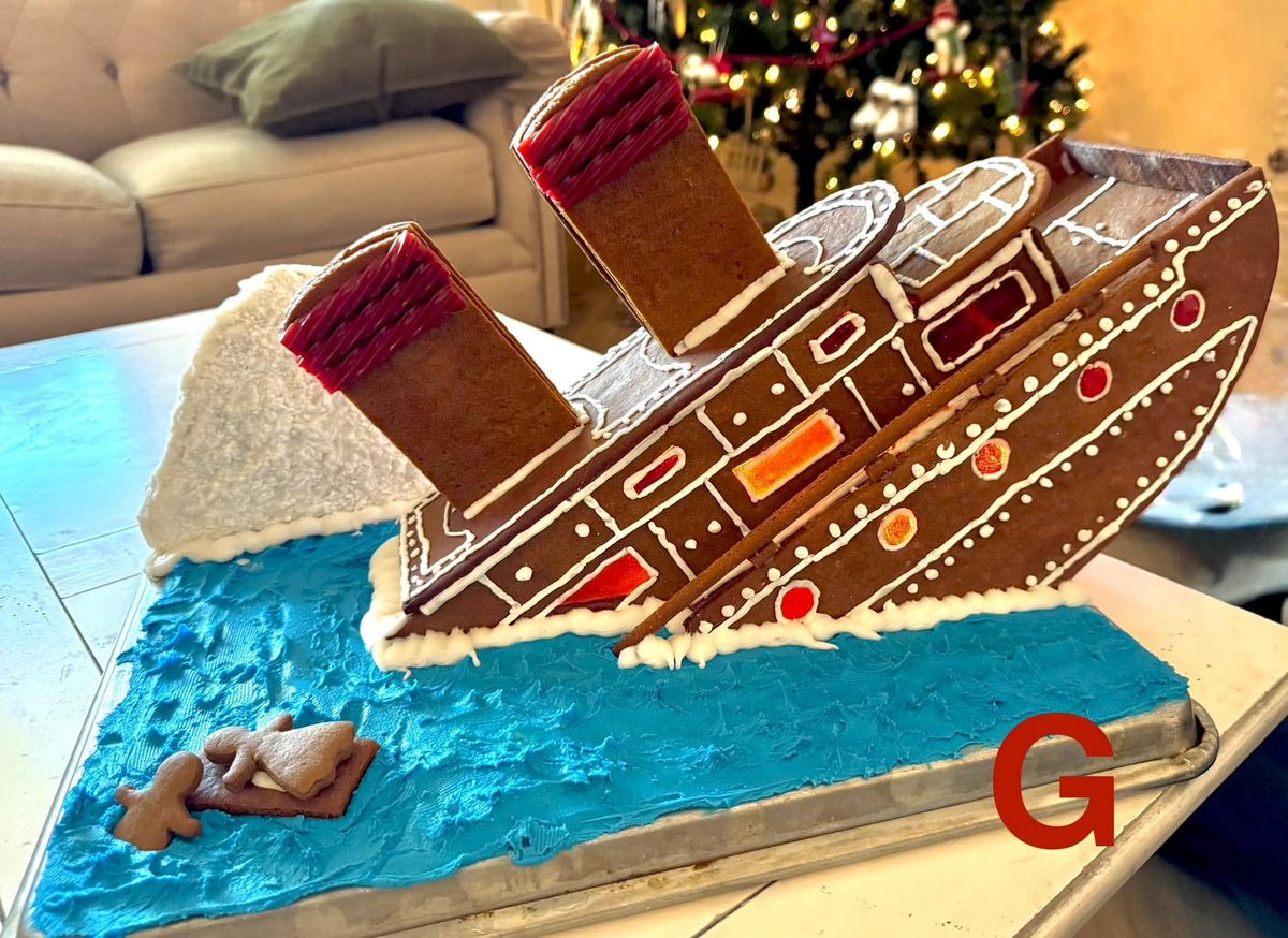 A family gingerbread contest entry: the Titanic beside an icing iceberg, with gingerbread Rose on a door